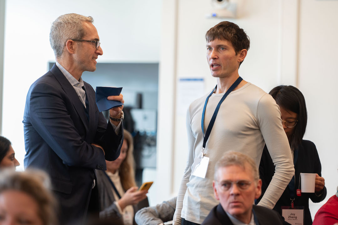 Attendees of the Future of Finance Forum mingle