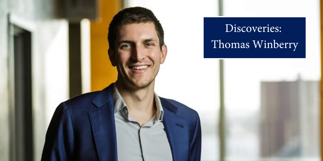 A person smiles toward the viewer in a sunlit room. Text appears that reads "Discoveries: Thomas Winberry" in white font in a blue box.